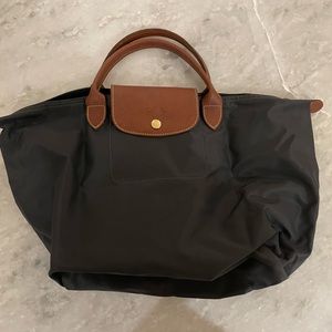 Black Longchamp Le Pliage nylon hand bag